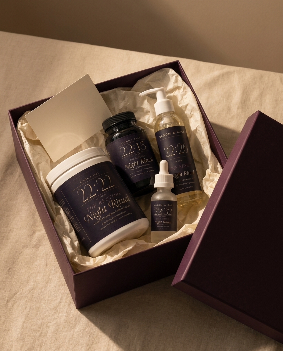 The Complete Night Ritual arriving — plum box, cream tissue, blank card